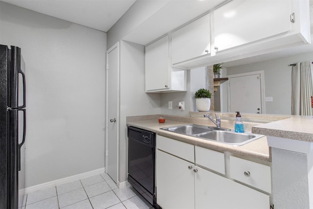 kitchen with black appliances, white cabinetry, sink, and light tile patterned floors