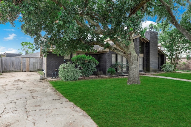 view of front of home with a front yard