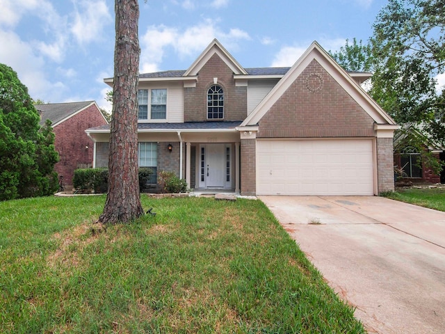 front of property featuring a porch, a front lawn, and a garage