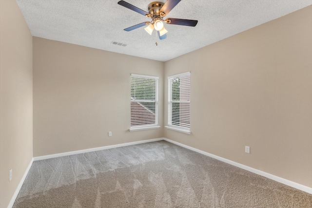 5635 Sage Manor Dr, Houston, TX 77084 - carpeted spare room featuring a textured ceiling, ceiling fan, and baseboards