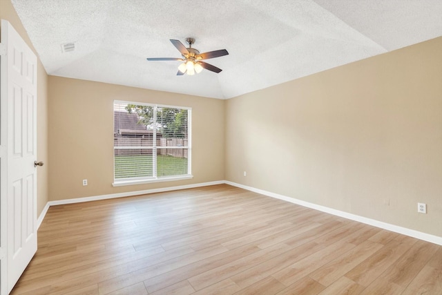 5635 Sage Manor Dr, Houston, TX 77084 - unfurnished room with ceiling fan, light wood-type flooring, baseboards, a textured ceiling, and lofted ceiling
