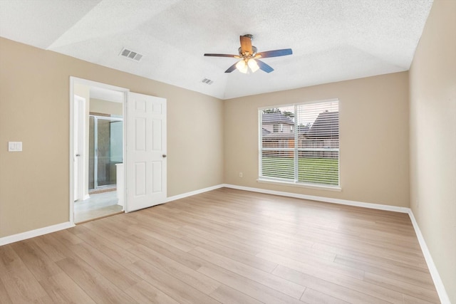 5635 Sage Manor Dr, Houston, TX 77084 - empty room with visible vents, ceiling fan, baseboards, and light wood-type flooring