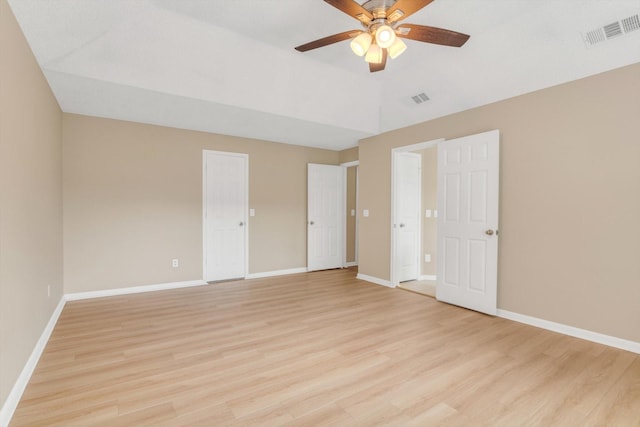 5635 Sage Manor Dr, Houston, TX 77084 - unfurnished bedroom with visible vents, light wood-style flooring, and baseboards