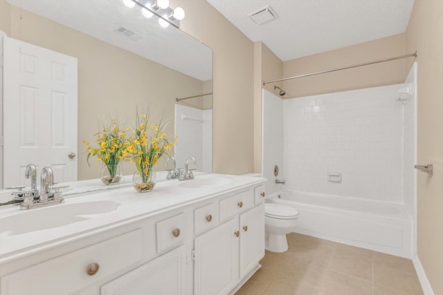 5635 Sage Manor Dr, Houston, TX 77084 - full bath featuring tile patterned floors, toilet, shower / tub combination, and a sink