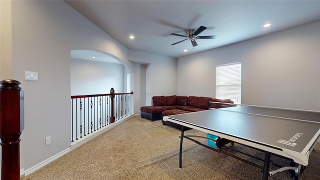 recreation room with carpet and ceiling fan