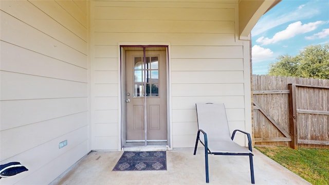 doorway to property with a patio area