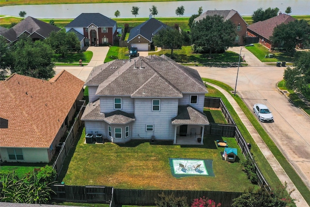 bird's eye view with a water view