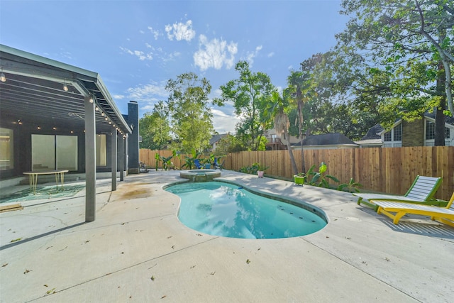 view of pool featuring a pergola, a patio area, and an in ground hot tub