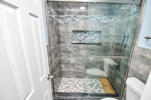 18306 Fresh Air Ct, Houston, TX 77084 - bathroom with a shower stall and toilet