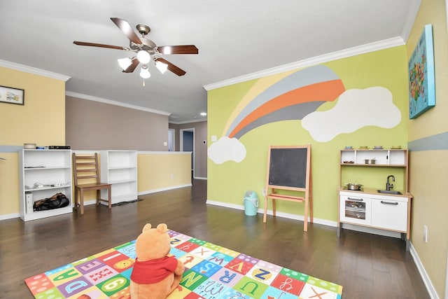 18306 Fresh Air Ct, Houston, TX 77084 - playroom with baseboards, ornamental molding, a ceiling fan, and wood finished floors