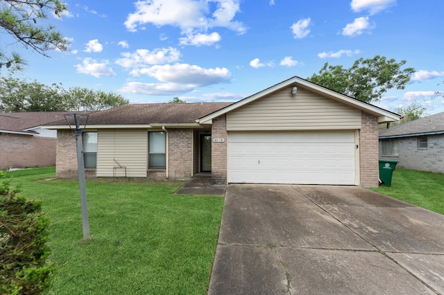 single story home featuring a garage and a front lawn