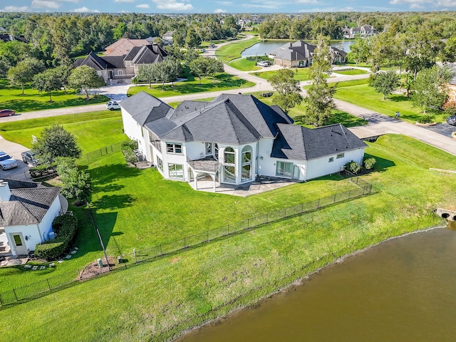 drone / aerial view with a water view