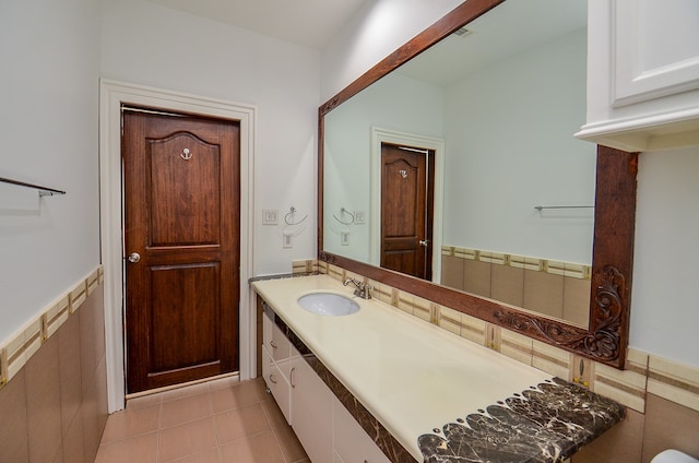 bathroom with vanity and tile patterned floors