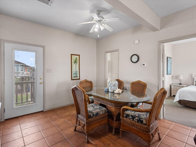 125 Driftwood Ct, Surfside Beach, TX 77541 - dining room with tile patterned flooring, a ceiling fan, baseboards, and visible vents