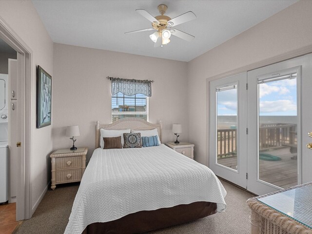 carpeted bedroom with ceiling fan, multiple windows, and access to outside