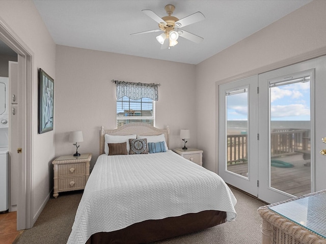 125 Driftwood Ct, Surfside Beach, TX 77541 - carpeted bedroom featuring baseboards, access to outside, stacked washer and dryer, and ceiling fan
