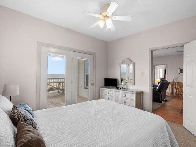 bedroom featuring carpet, ceiling fan, and access to exterior