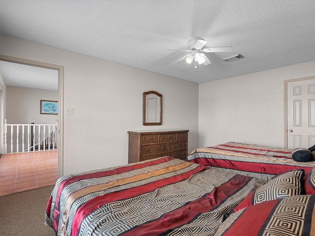 125 Driftwood Ct, Surfside Beach, TX 77541 - bedroom featuring ceiling fan, visible vents, and carpet