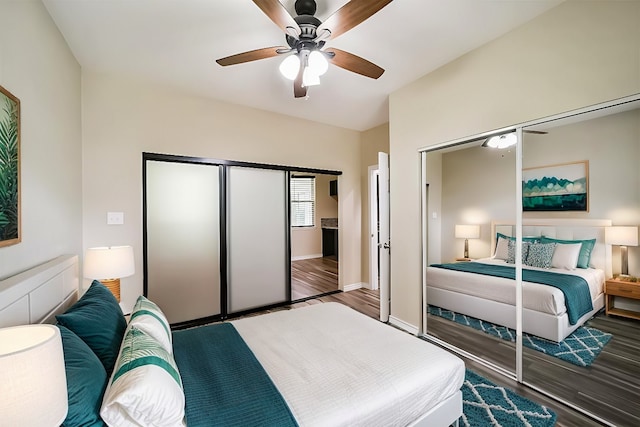 bedroom with a closet, baseboards, ceiling fan, and wood finished floors