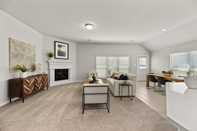 living room with light carpet and lofted ceiling