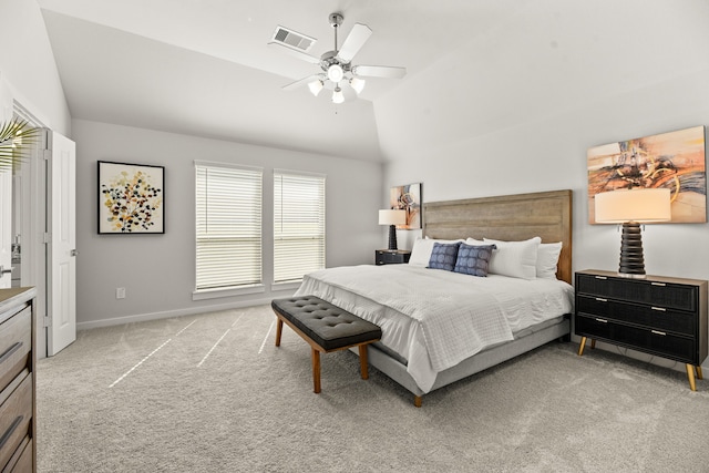 bedroom featuring ceiling fan, lofted ceiling, and light carpet