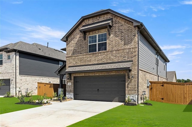 view of front facade featuring a front yard and a garage