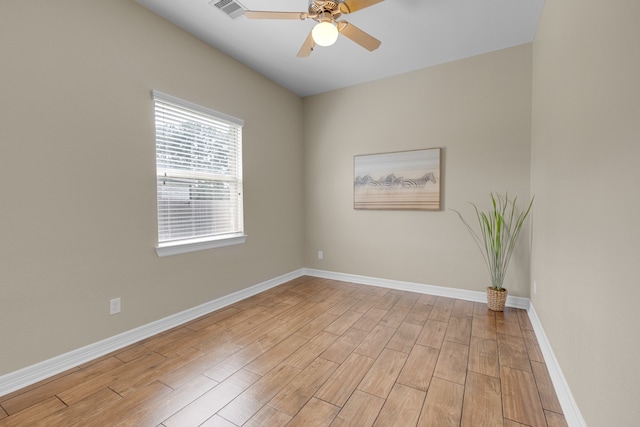 spare room with ceiling fan and light hardwood / wood-style flooring