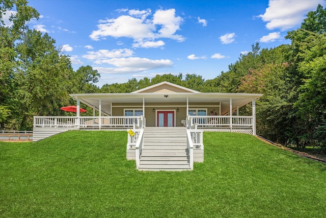 view of front of property with covered porch and a front lawn