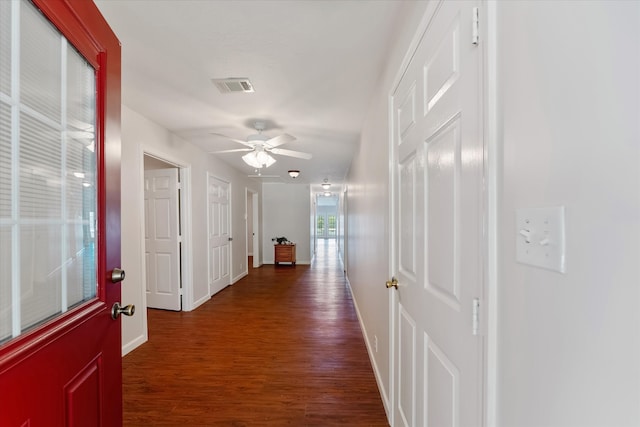 hall featuring dark hardwood / wood-style floors