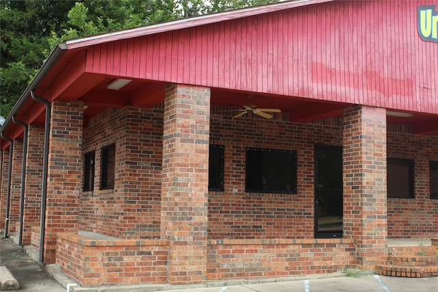 view of home's exterior featuring ceiling fan