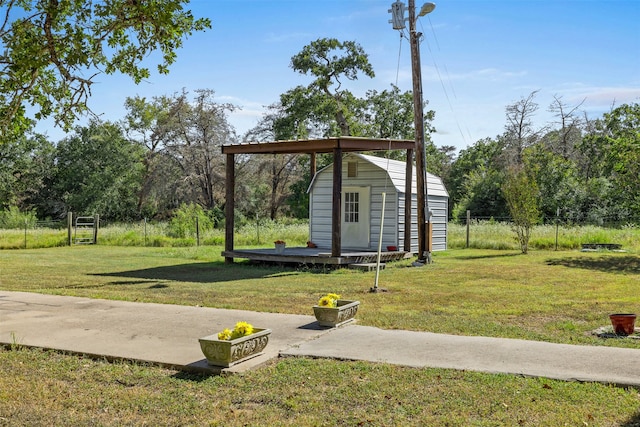 view of outbuilding with a yard