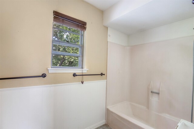 bathroom featuring washtub / shower combination