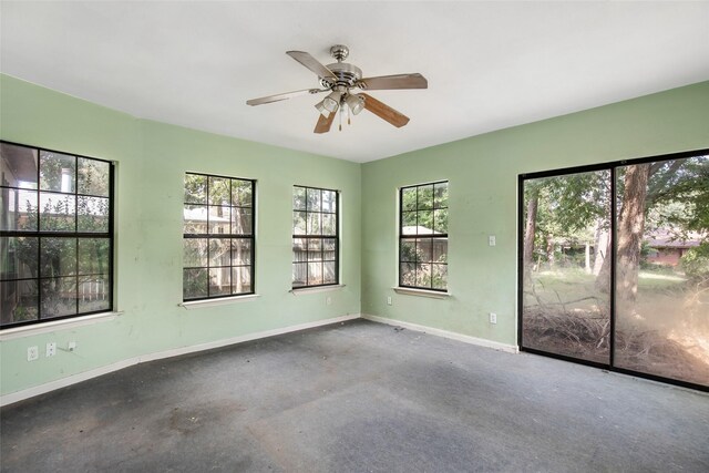 spare room with ceiling fan