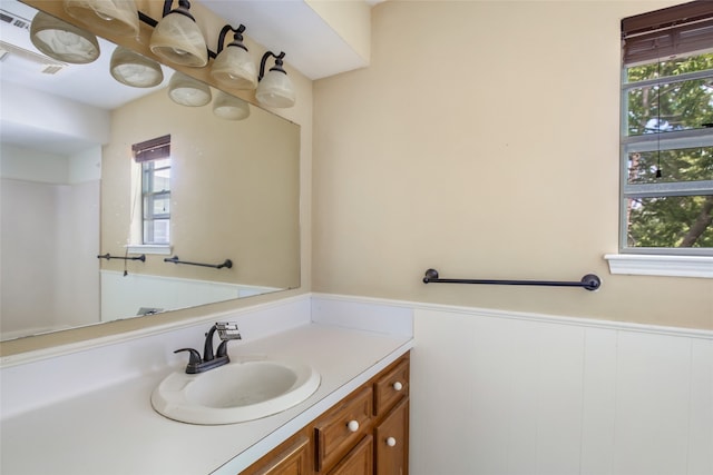 bathroom with a wealth of natural light and vanity