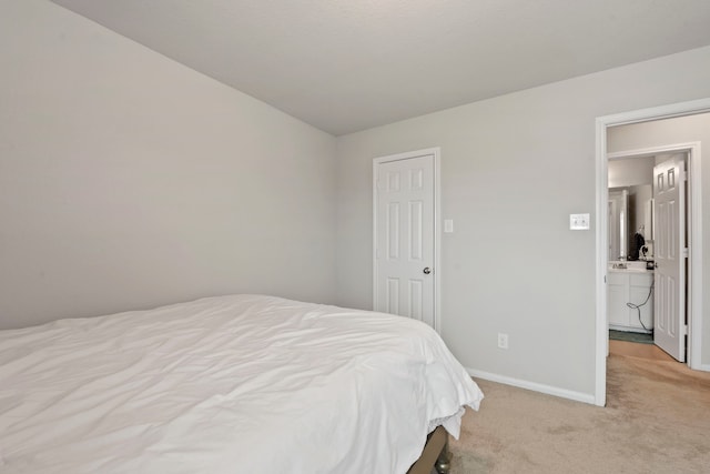 carpeted bedroom featuring lofted ceiling