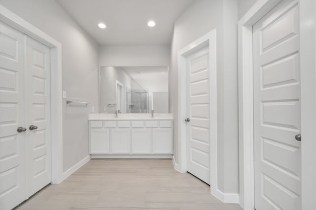 bathroom featuring vanity and walk in shower