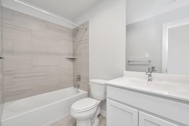 full bathroom featuring toilet, vanity, and tiled shower / bath combo