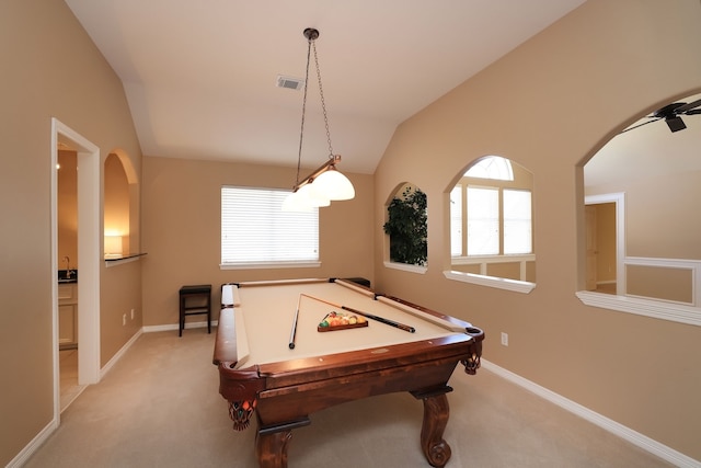 recreation room featuring light colored carpet, visible vents, pool table, vaulted ceiling, and baseboards