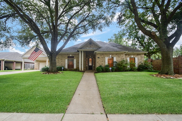 view of front of home with a garage and a front yard