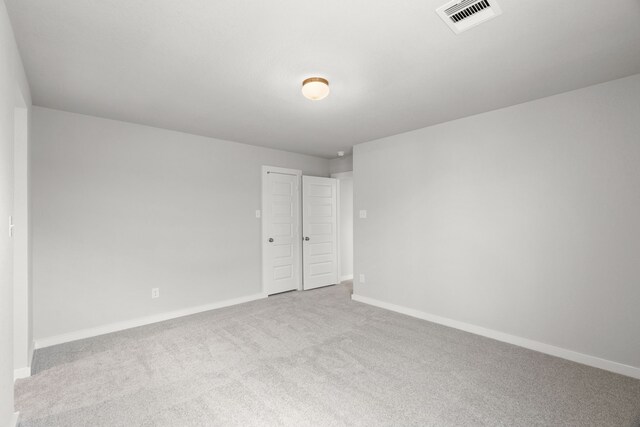 8427 Northern Pintail Dr, Houston, TX 77049 - carpeted empty room with baseboards and visible vents