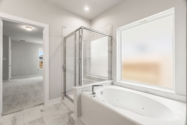 8427 Northern Pintail Dr, Houston, TX 77049 - full bathroom featuring visible vents, baseboards, marble finish floor, a tub with jets, and a stall shower