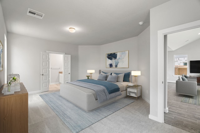8427 Northern Pintail Dr, Houston, TX 77049 - bedroom with ensuite bathroom, carpet, baseboards, and visible vents