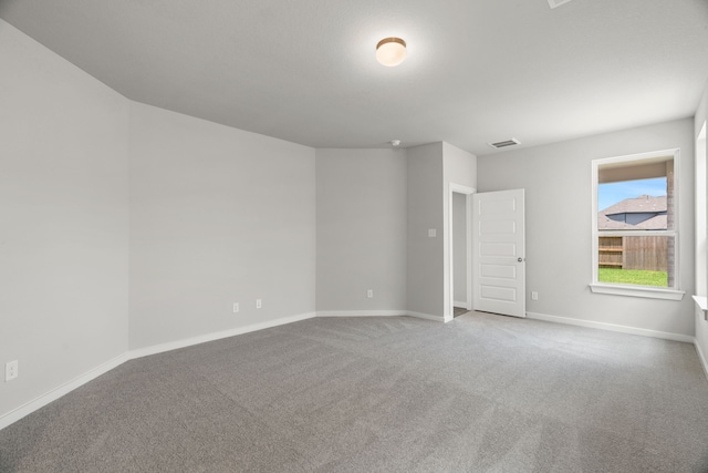 8427 Northern Pintail Dr, Houston, TX 77049 - carpeted empty room with baseboards and visible vents