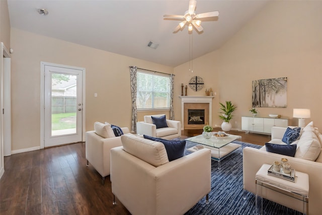 living room featuring high vaulted ceiling, ceiling fan, and dark hardwood / wood-style floors