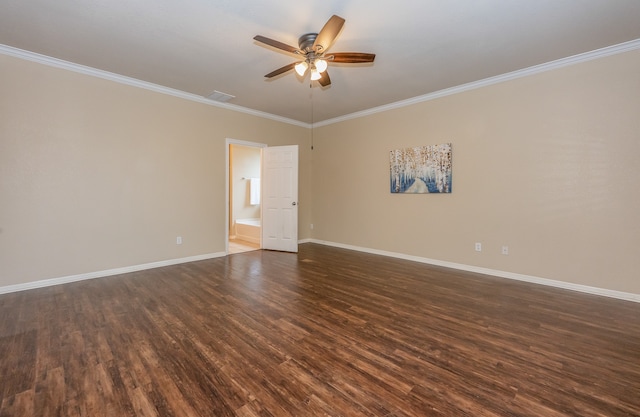 empty room featuring ornamental molding, dark hardwood / wood-style floors, and ceiling fan