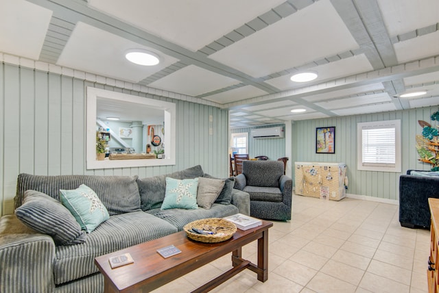 tiled living room with coffered ceiling, wood walls, and a wall mounted air conditioner