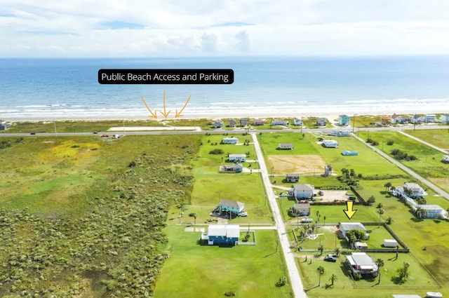 bird's eye view with a view of the beach and a water view