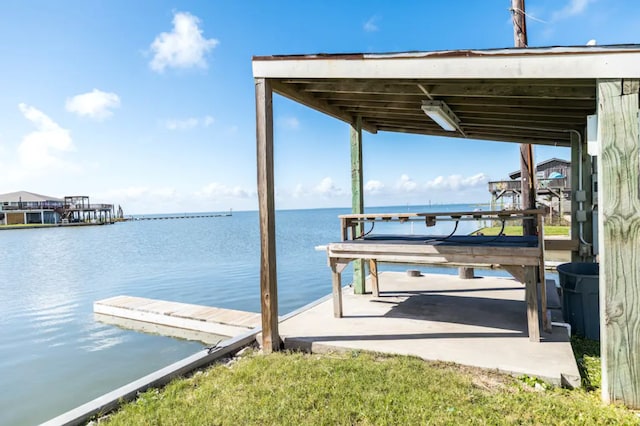 view of dock with a water view