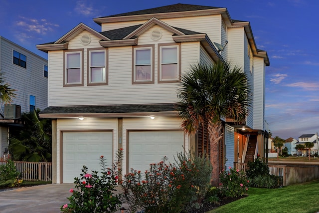 view of front of home with a garage