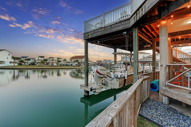 dock area with a water view